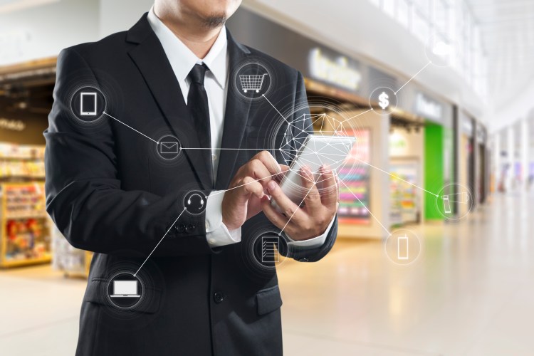 graphicstock-man-using-mobile-payments-online-shopping-and-icon-customer-network-connection-on-screen-m-banking-and-omni-channel_rdHeS6oPgjl (1)
